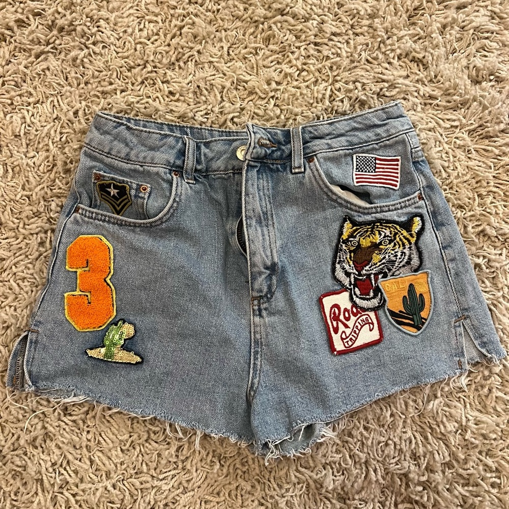 Topshop distressed jean shorts with decorative patches